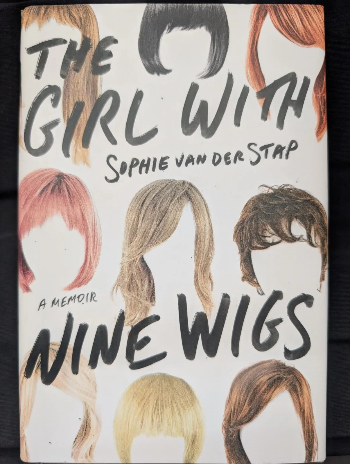 The Girl with Nine Wigs